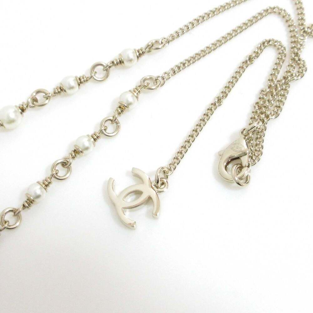 CHANEL Gold Pearl Logo Necklace - Picture 7 of 11